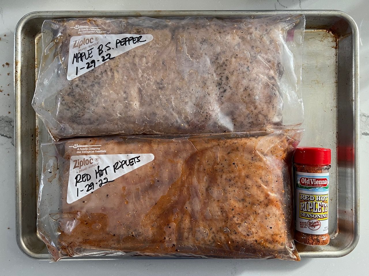 Pork Belly in plastic bags, curing / brining.