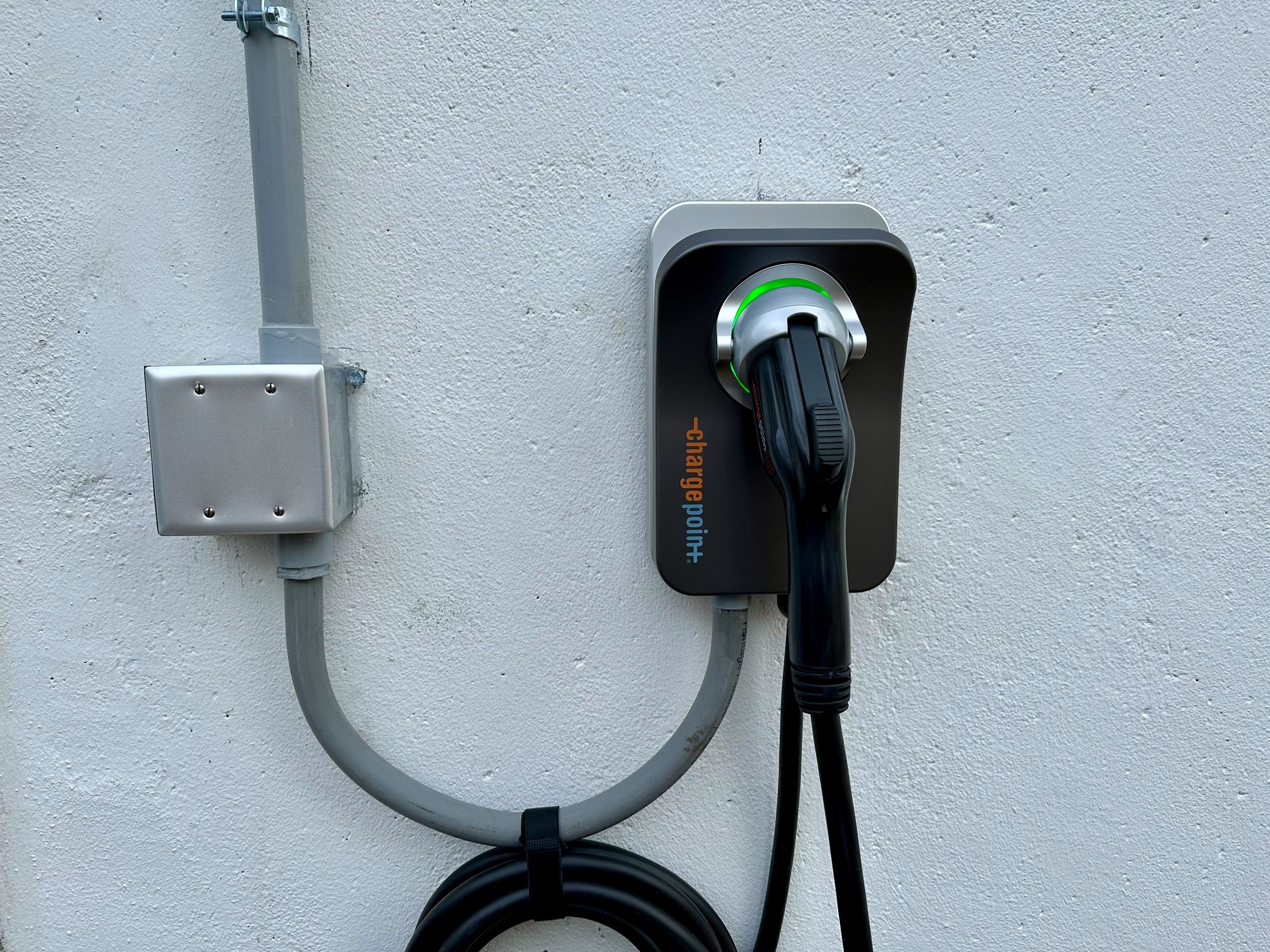 A Chargepoint EVSE unit mounted on an exterior wall.